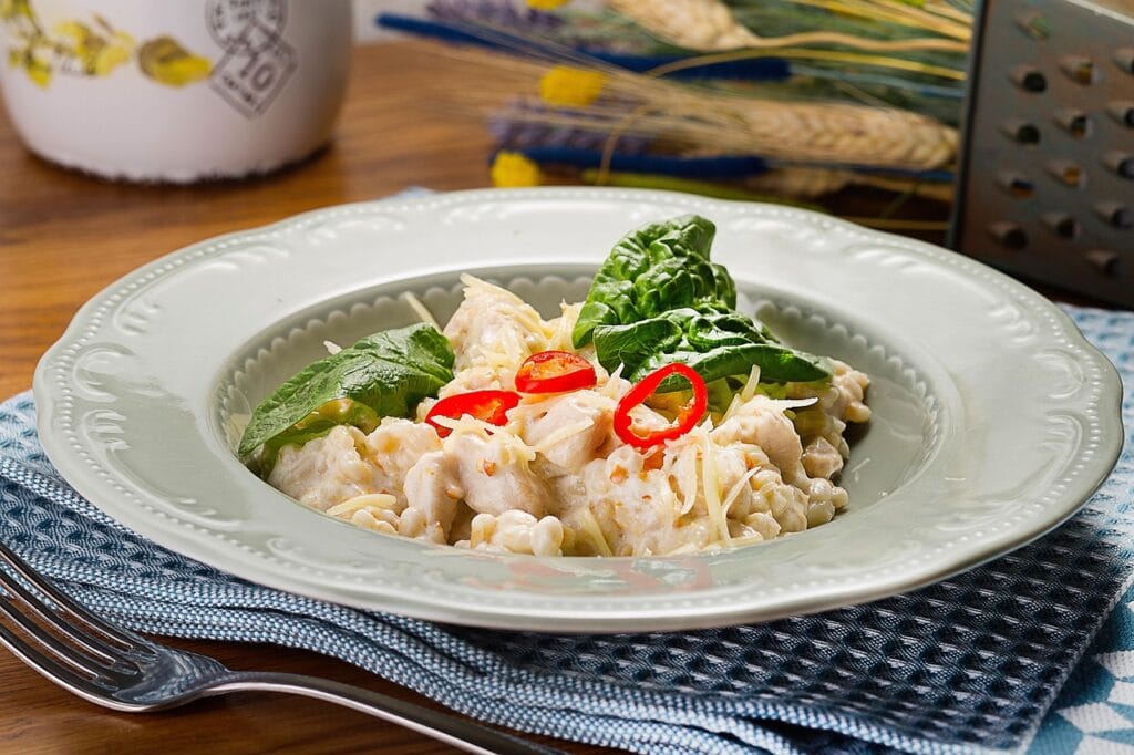 A canned chicken salad recipe served in a circular white plate