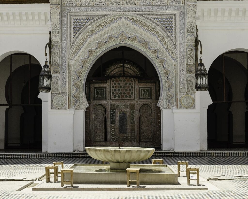 Intricately decorated courtyard of traditional Moroccan architecture, a highlight in Morocco travel.