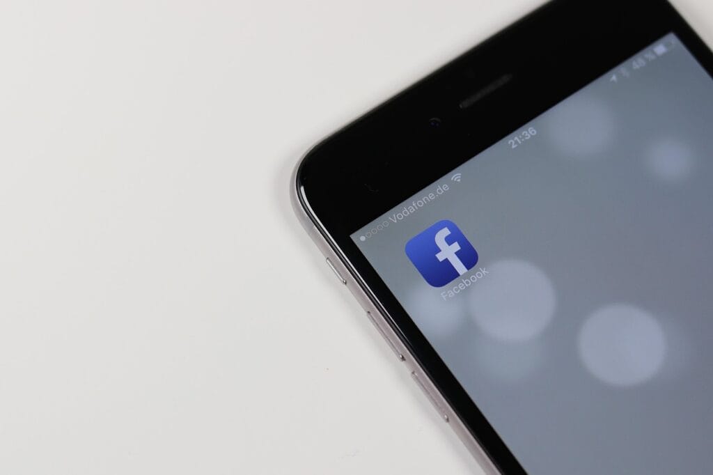 Smartphone screen displaying a single Facebook app icon on a minimalist background.
